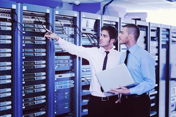 Men looking at servers